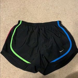 Black nike shorts with multi color stripes
